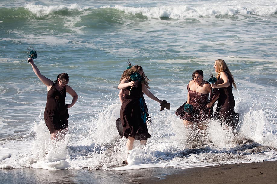 Bridesmaids Playing in the Surf